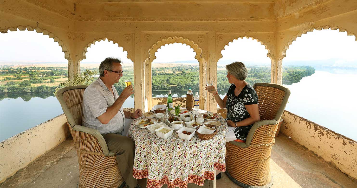 Guests having lunch on roof top